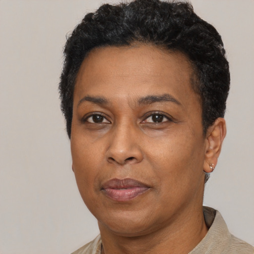 Neutral black adult female with short  black hair and brown eyes