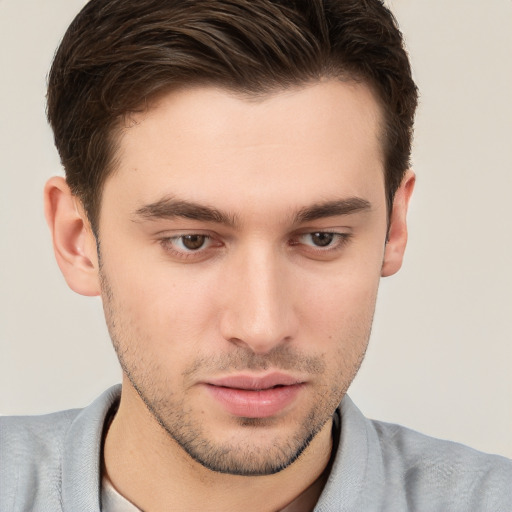 Neutral white young-adult male with short  brown hair and brown eyes