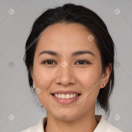 Joyful asian young-adult female with medium  brown hair and brown eyes