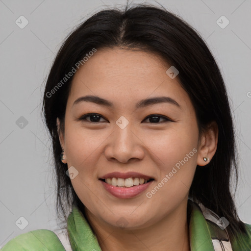 Joyful white young-adult female with long  brown hair and brown eyes