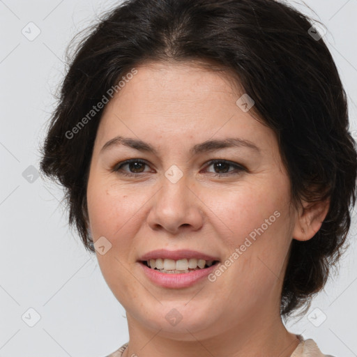 Joyful white adult female with medium  brown hair and brown eyes