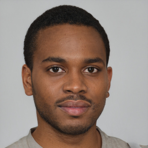 Neutral black young-adult male with short  brown hair and brown eyes
