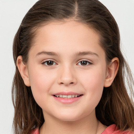 Joyful white child female with long  brown hair and brown eyes