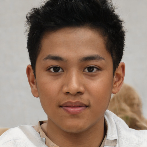 Joyful latino young-adult male with short  brown hair and brown eyes