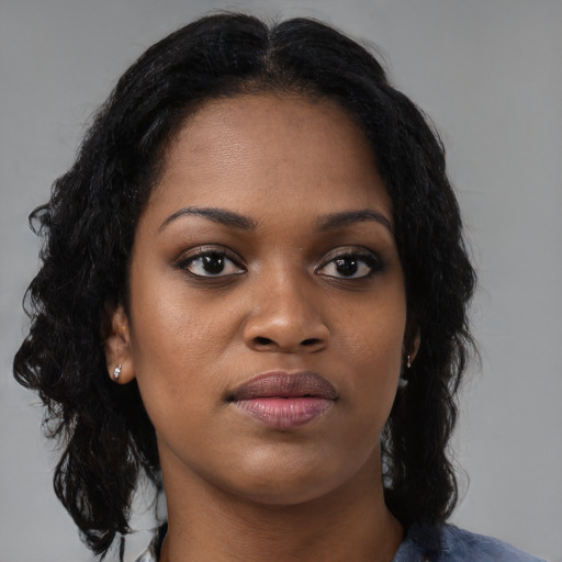 Neutral black young-adult female with long  black hair and brown eyes