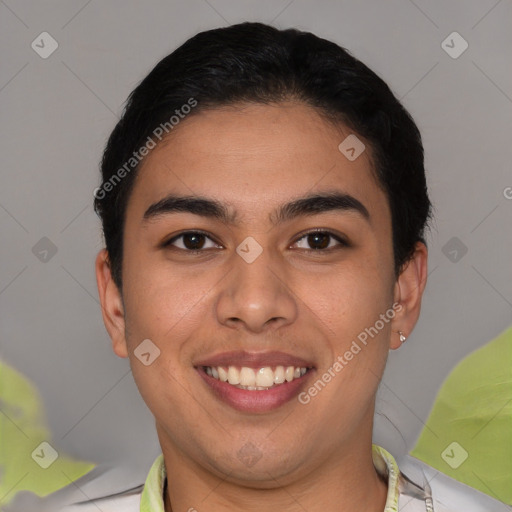 Joyful latino young-adult male with short  brown hair and brown eyes