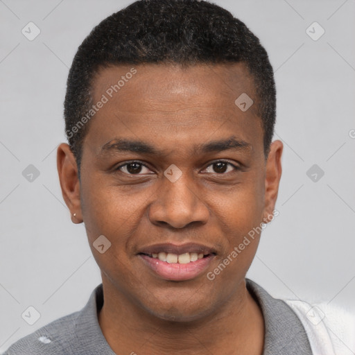 Joyful black young-adult male with short  brown hair and brown eyes