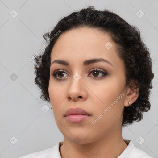 Neutral latino young-adult female with short  black hair and brown eyes