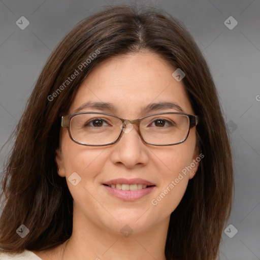 Joyful white adult female with medium  brown hair and brown eyes