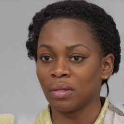 Neutral black young-adult female with short  brown hair and brown eyes