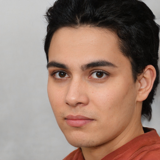 Neutral white young-adult male with medium  brown hair and brown eyes