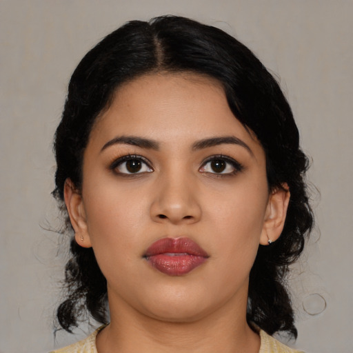 Neutral latino young-adult female with medium  black hair and brown eyes