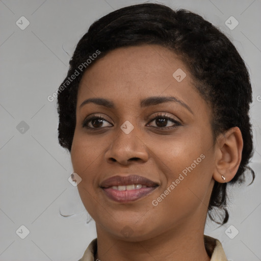 Joyful black young-adult female with medium  brown hair and brown eyes