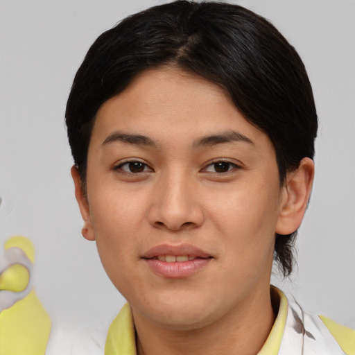 Joyful asian young-adult female with short  brown hair and brown eyes