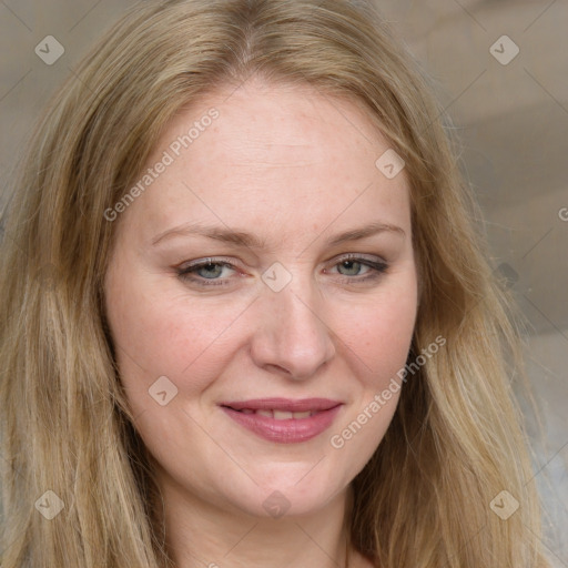 Joyful white young-adult female with long  brown hair and blue eyes