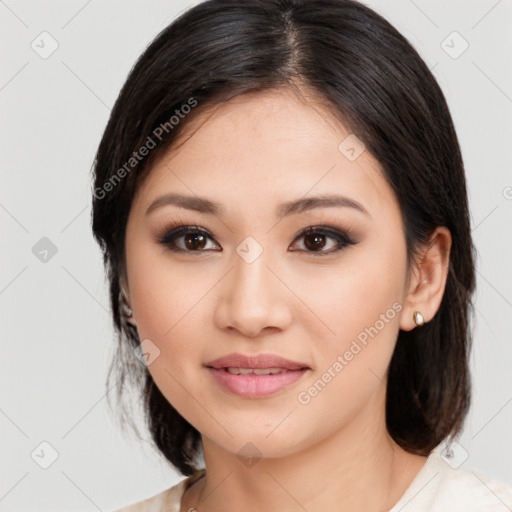 Joyful white young-adult female with medium  brown hair and brown eyes