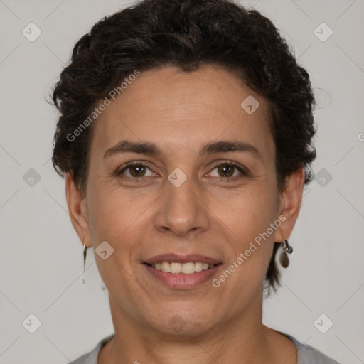 Joyful white adult female with short  brown hair and brown eyes