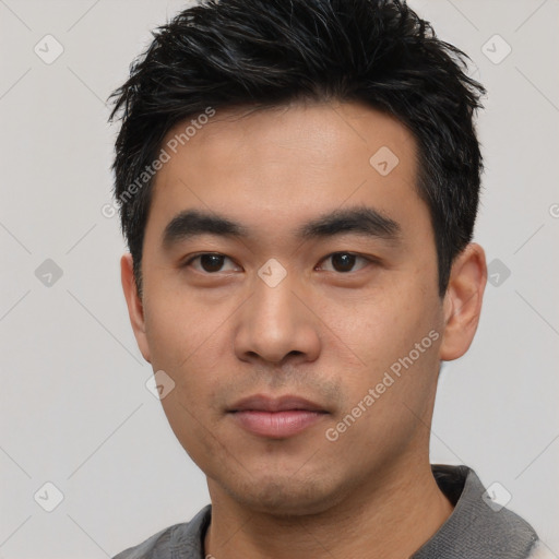 Neutral asian young-adult male with short  black hair and brown eyes