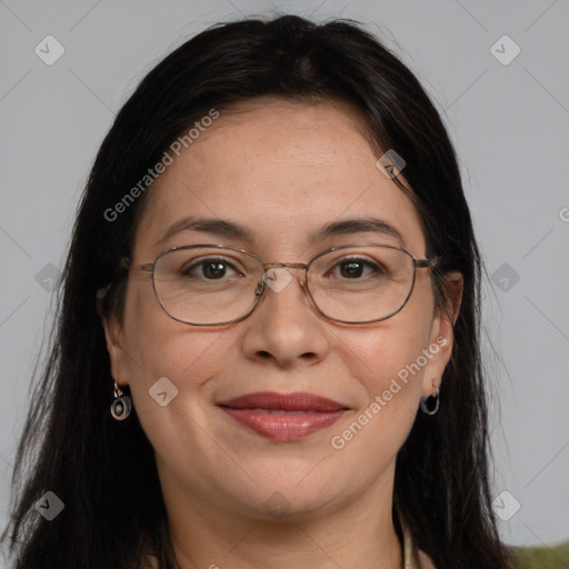 Joyful white adult female with long  brown hair and brown eyes