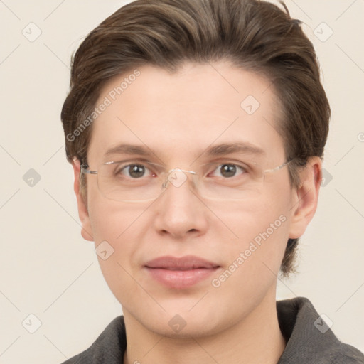 Joyful white adult male with short  brown hair and grey eyes