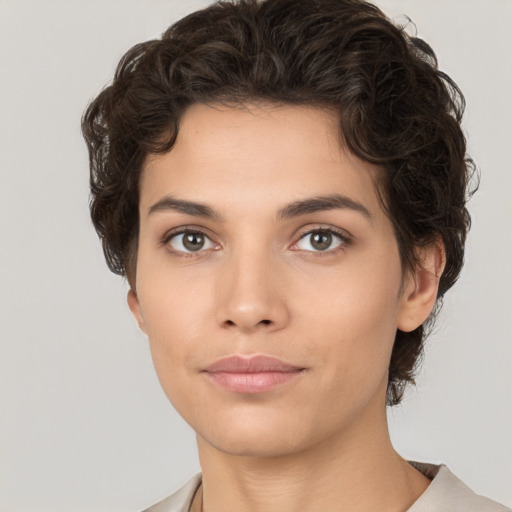 Neutral white young-adult female with short  brown hair and brown eyes