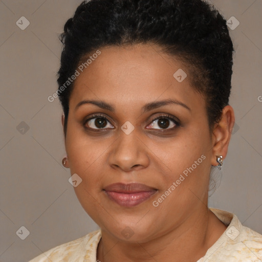 Joyful black young-adult female with short  brown hair and brown eyes