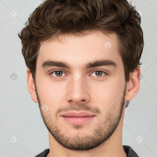 Neutral white young-adult male with short  brown hair and brown eyes