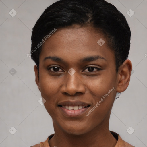 Joyful black young-adult female with short  black hair and brown eyes