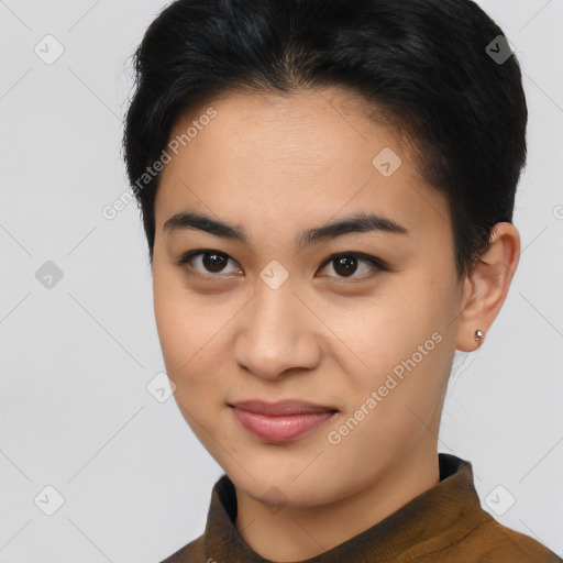 Joyful asian young-adult female with short  brown hair and brown eyes