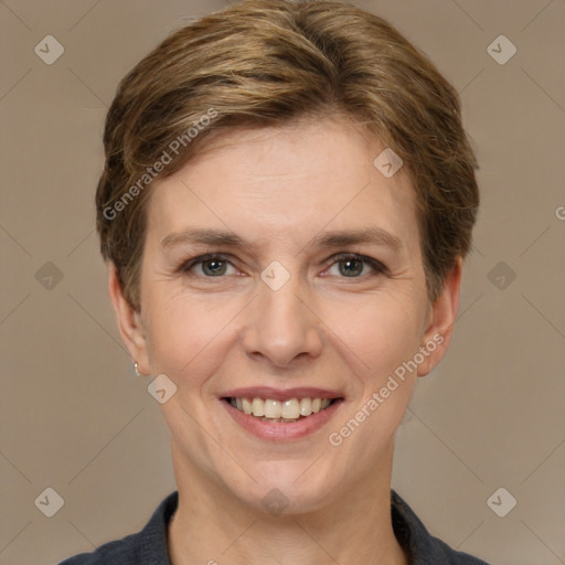 Joyful white adult female with short  brown hair and brown eyes