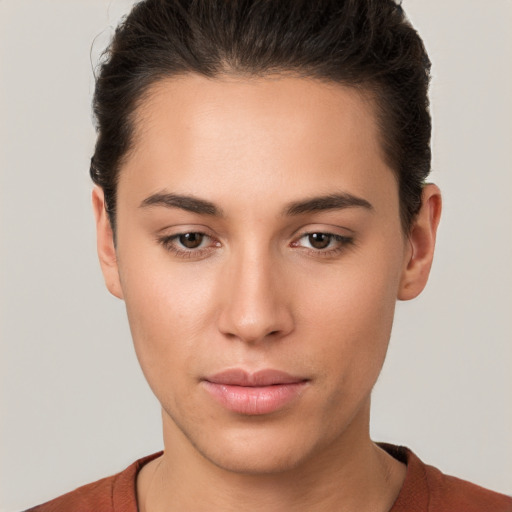 Neutral white young-adult female with short  brown hair and brown eyes