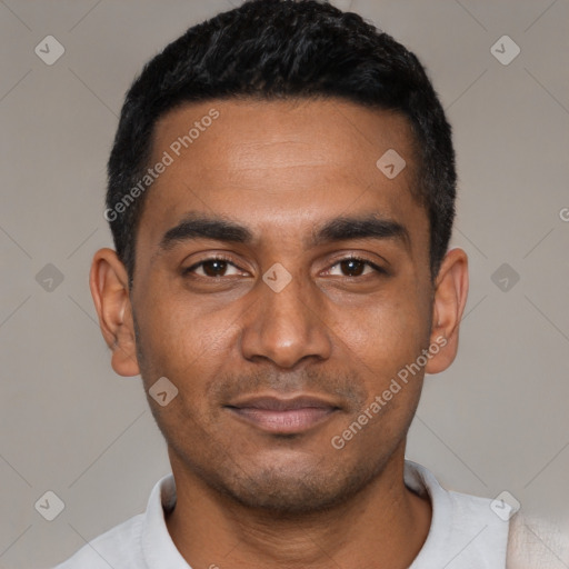 Joyful black young-adult male with short  black hair and brown eyes