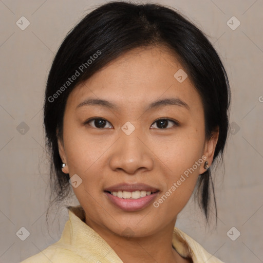 Joyful asian young-adult female with medium  brown hair and brown eyes