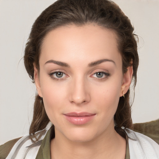 Neutral white young-adult female with medium  brown hair and brown eyes