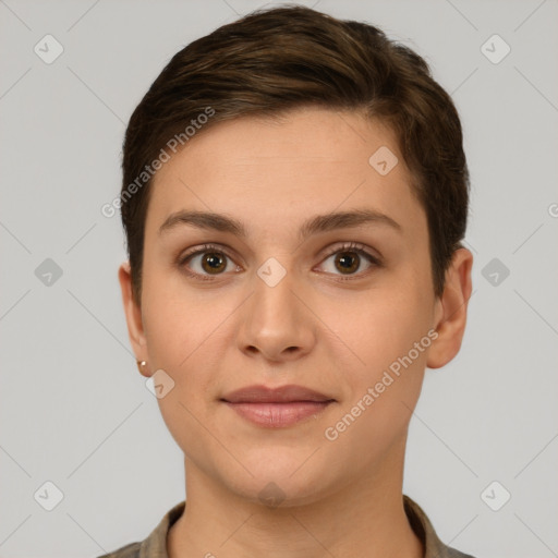 Joyful white young-adult female with short  brown hair and brown eyes