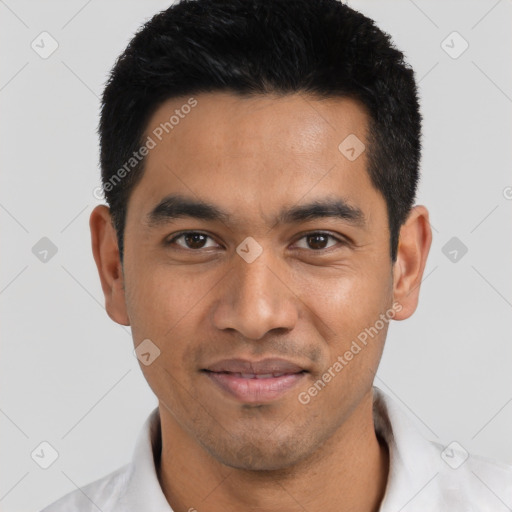 Joyful asian young-adult male with short  black hair and brown eyes