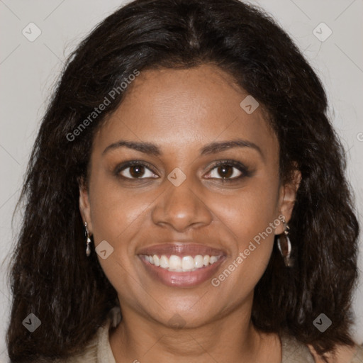 Joyful black young-adult female with medium  brown hair and brown eyes