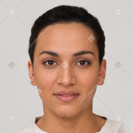 Joyful latino young-adult female with short  brown hair and brown eyes