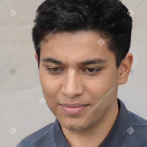 Joyful latino young-adult male with short  black hair and brown eyes