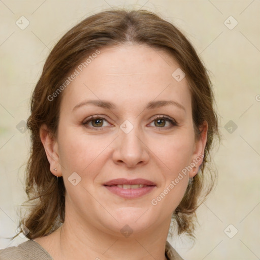 Joyful white young-adult female with medium  brown hair and green eyes