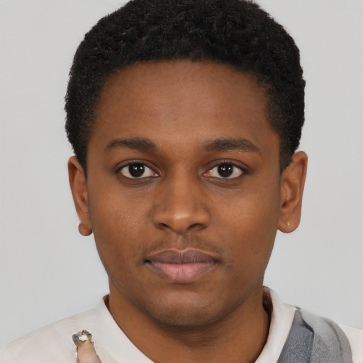 Neutral black young-adult male with short  brown hair and brown eyes