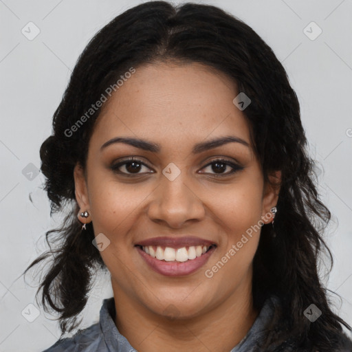 Joyful black young-adult female with long  black hair and brown eyes