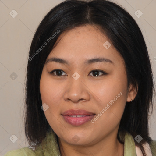 Joyful asian young-adult female with long  brown hair and brown eyes