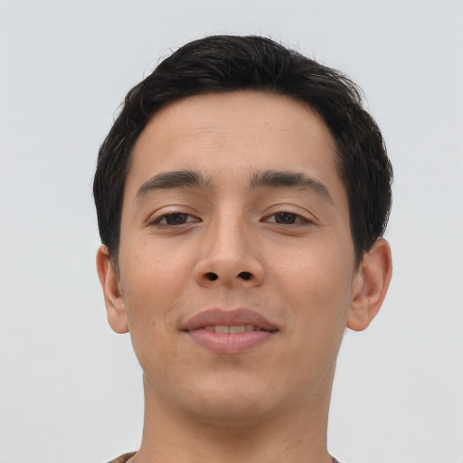 Joyful asian young-adult male with short  brown hair and brown eyes