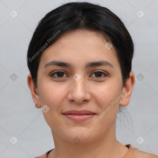 Joyful white young-adult female with short  brown hair and brown eyes