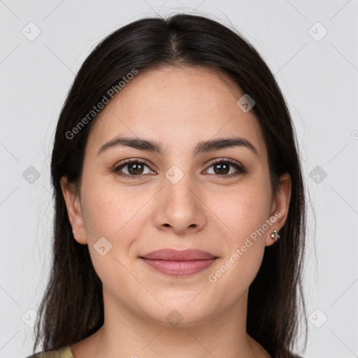 Joyful white young-adult female with long  brown hair and brown eyes