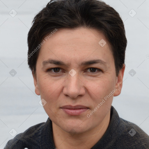 Joyful white adult female with short  brown hair and brown eyes