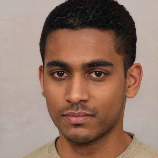 Neutral latino young-adult male with short  black hair and brown eyes