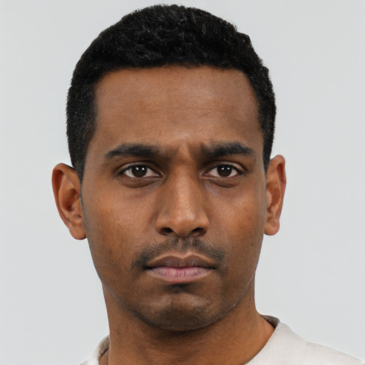 Neutral black young-adult male with short  black hair and brown eyes