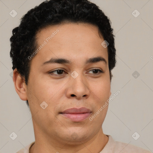 Joyful latino young-adult male with short  brown hair and brown eyes